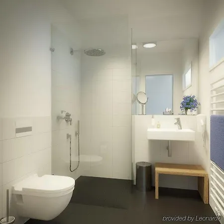 מלון Gaestehaus Am Schloss 3*